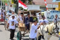 Ketua DPD Golkar Bone Andi Fahsar M Padjalangi saat mengantar Pasangan Rio-Amir Mendaftar di KPU Bone