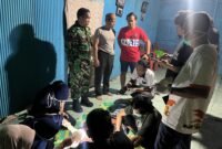 Sat Reskrim Polres Bone saat melakukan identifikasi terhadap korban.