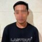 Terduga pelaku saat diamanakan polisi.